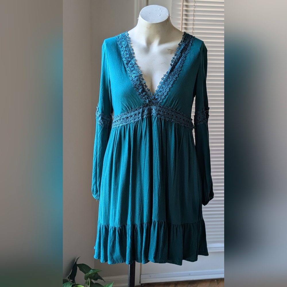 Emerald green Deep V dress from Francesca’s